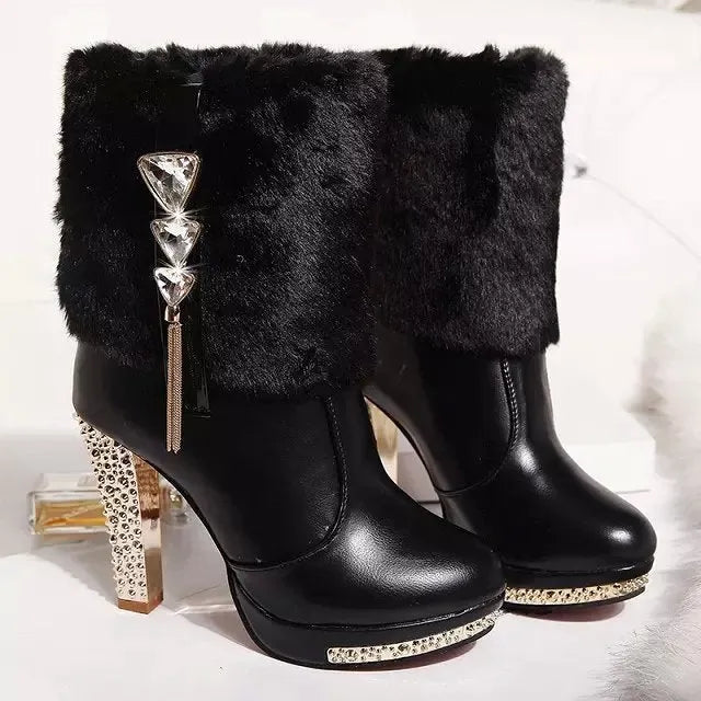 Women's black chunky high heel ankle boot with a pointed toe, made from artificial PU leather.