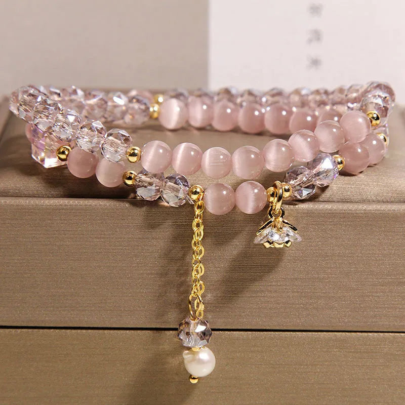 New Chinese style gold plated double ring bracelet for women with crystal and gemstone inlay in pink cat eye colour