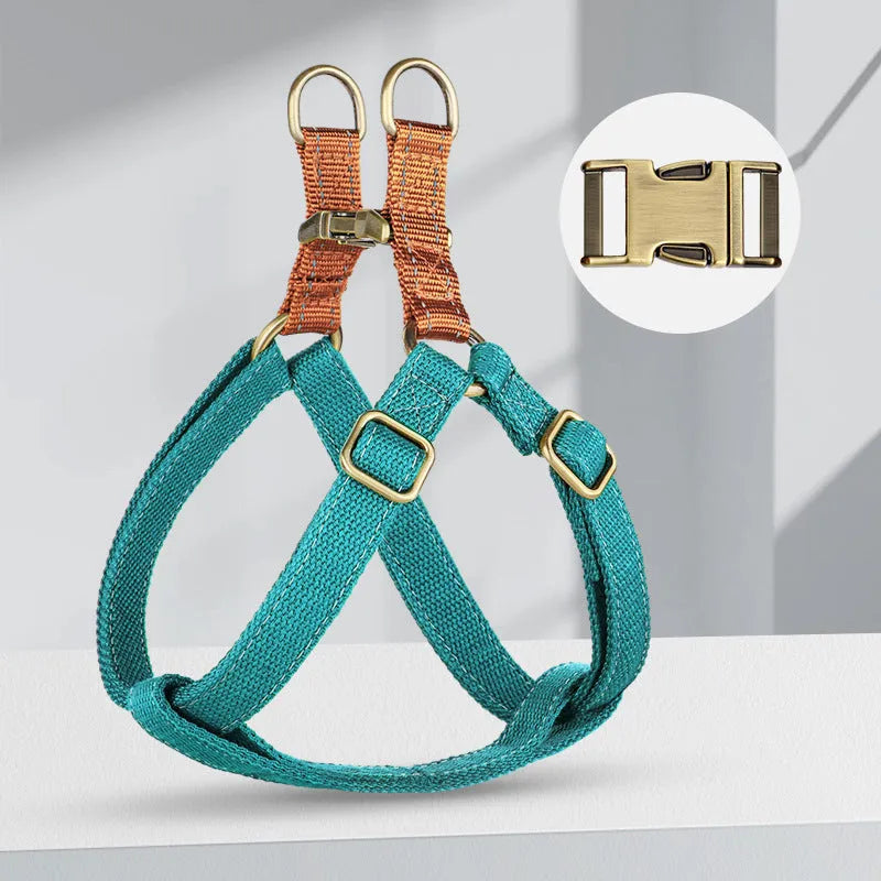 Brown vest-style dog leash harness on small dog showing cotton nylon construction and alloy fastener