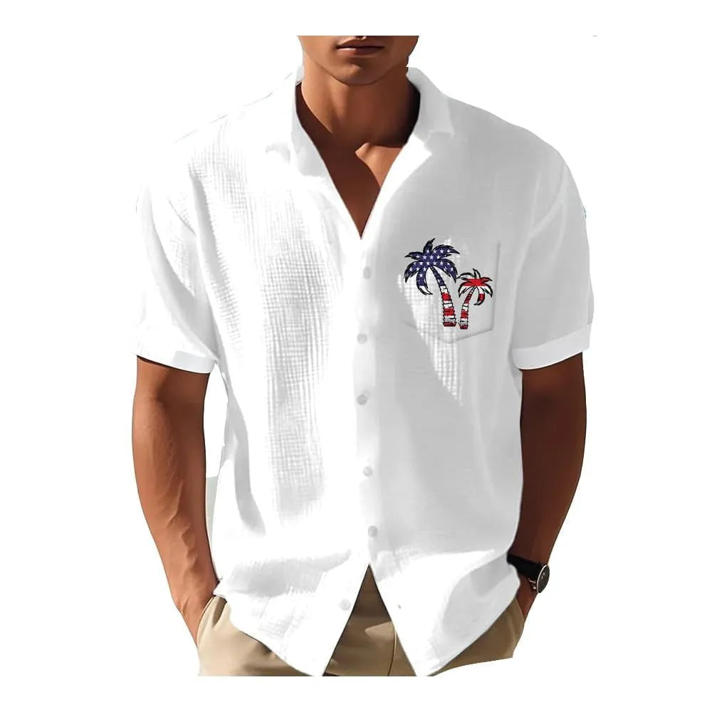 Man wearing a loose fit short sleeve Hawaiian shirt with a colourful digital print pattern.