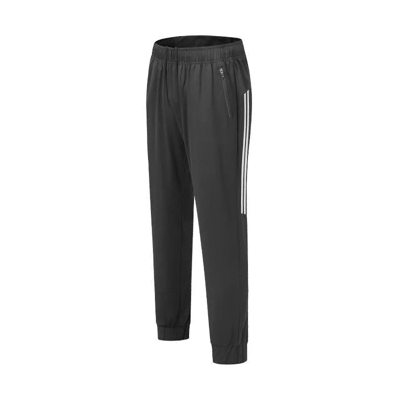 Men's black running trousers with mid waist design and breathable polyester construction for spring exercise