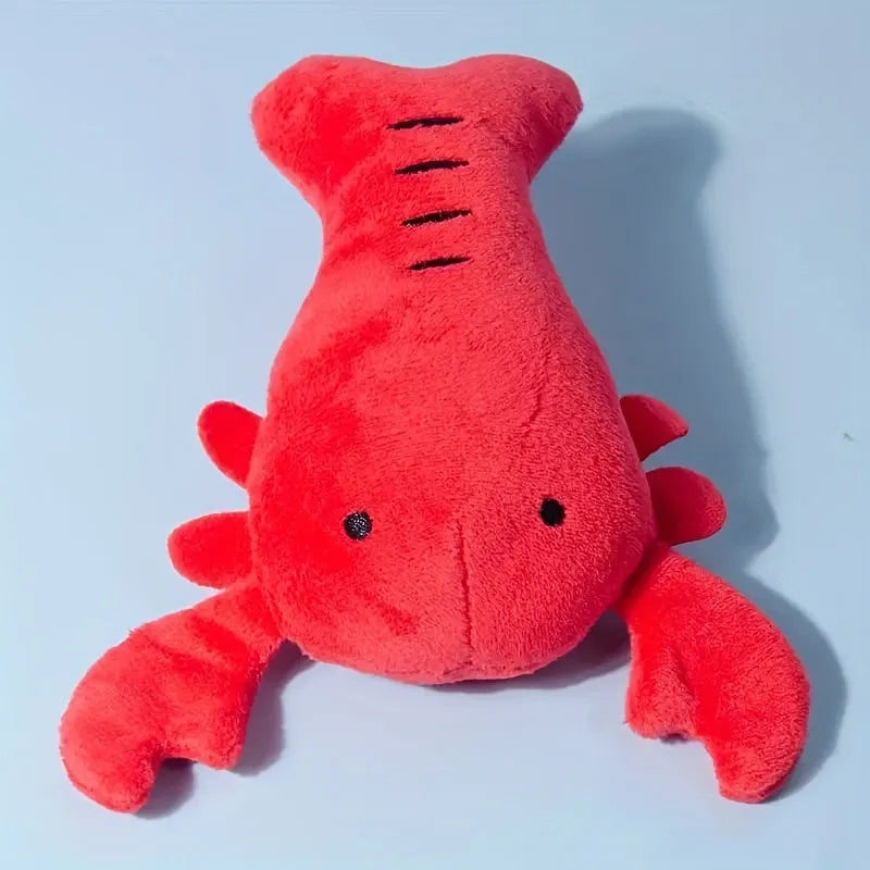 Red lobster-shaped squeaky plush dog toy with bite-resistant construction for small and medium breeds