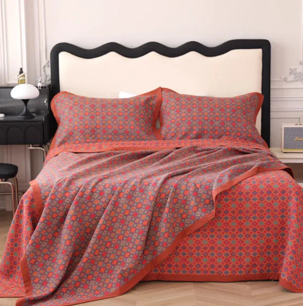 Cotton gauze bed blanket set with floral pattern including blanket and two pillowcases