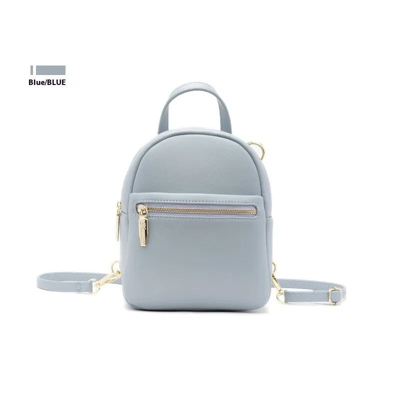 Soft PU mini backpack in street trend style with three-dimensional outer pocket, shown in one of six colour options.