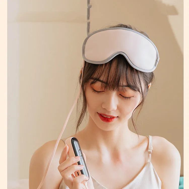 Green portable eye spa massage goggles showing suede shell and soft super fibre interior.