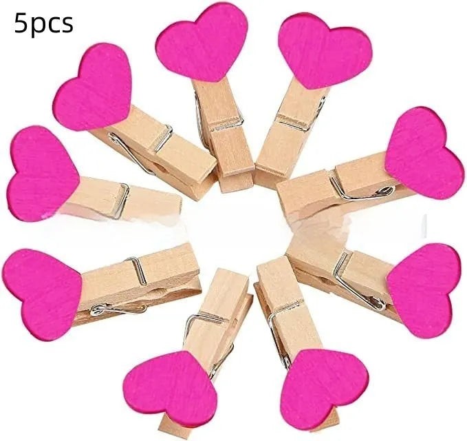 Five handmade solid wood heart-shaped hair clips in red, white, pink, yellow, and rose colours