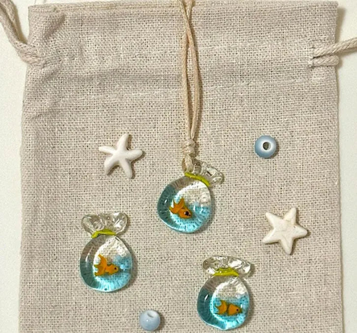 Women's necklace with coloured glaze joker skirt pendant on a cotton linen clavicle chain