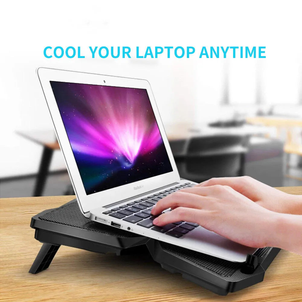 Blue laptop cooling base with four illuminated fans and manual speed controls