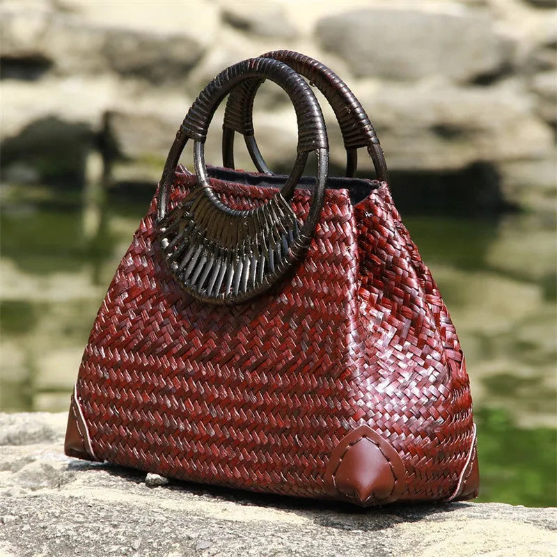 Handwoven rattan straw bag for women with wooden handle, cotton lining, and zipper closure in khaki colour