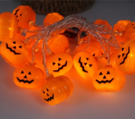 Halloween LED string lights with pumpkin, ghost and bat pendants on 1.2 metre white cord