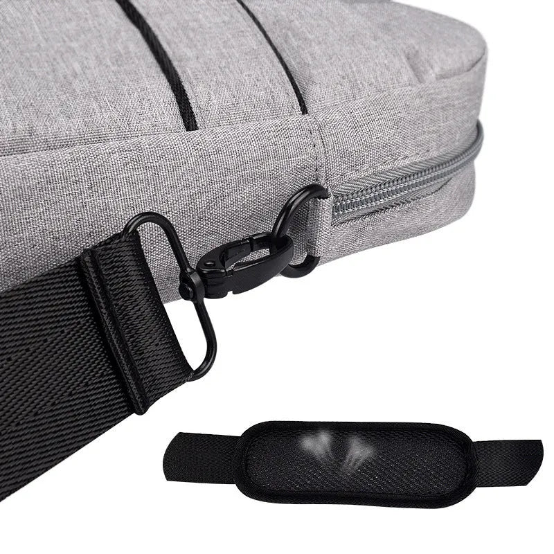 Black Oxford cloth laptop shoulder bag with matte finish, zipper closure, and soft handle for 15.6 inch laptop