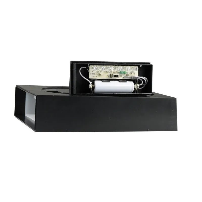 Solar powered outdoor house number light with white LEDs and wall mount.