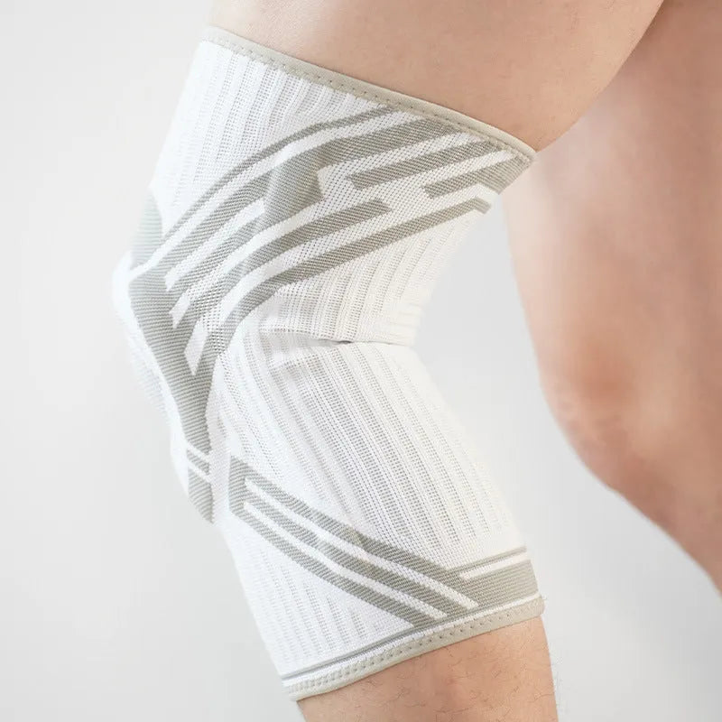 Blue cotton knee pad for basketball and running sports with elastic construction