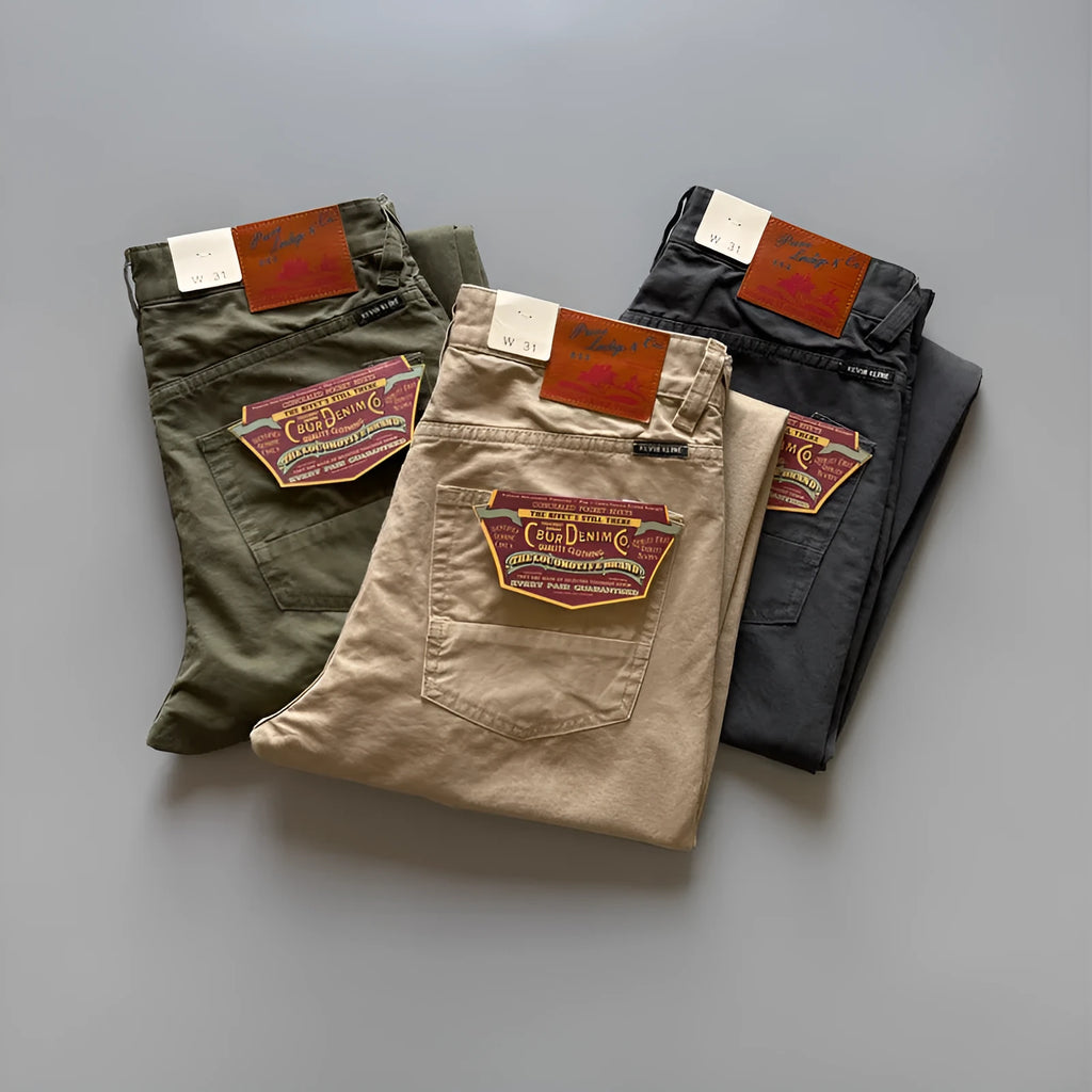 Men's straight-leg cotton casual trousers in army green colour, laid flat to show mid-waist and trousers length.