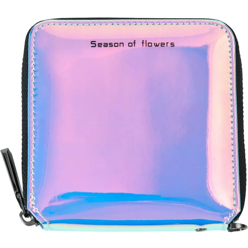 Women's short folding Korean-style wallet in glitter blue or green colours showing 11cm dimensions
