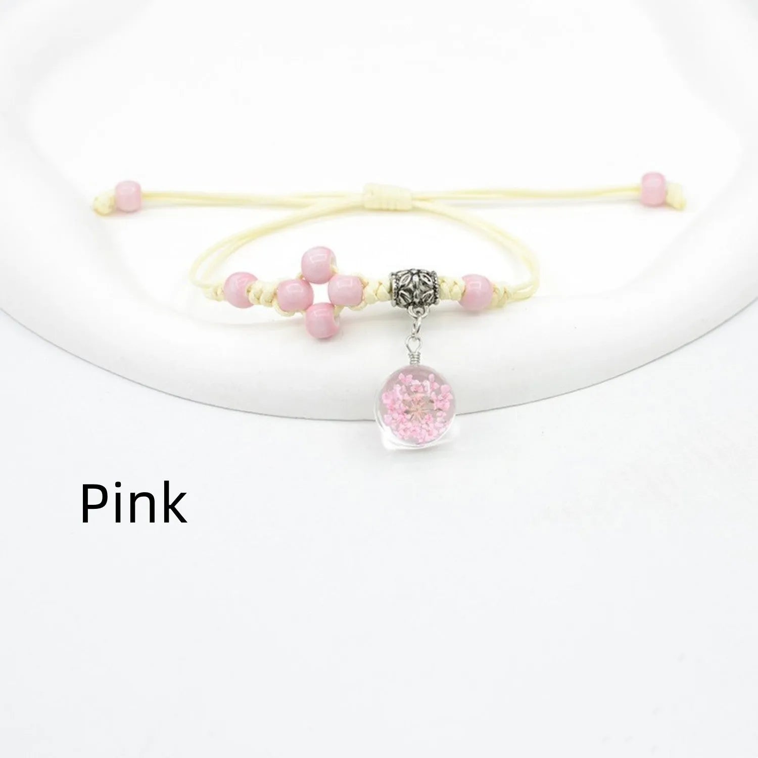 Women's hand-woven glass dried flower bracelet with large 1.4 cm beads in multiple colour options.