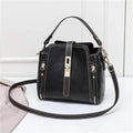 Women small faux leather shoulder bag with detachable strap and turn-lock closure, black colour