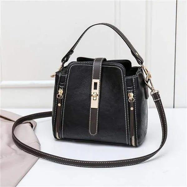 Women small faux leather shoulder bag with detachable strap and turn-lock closure, black colour