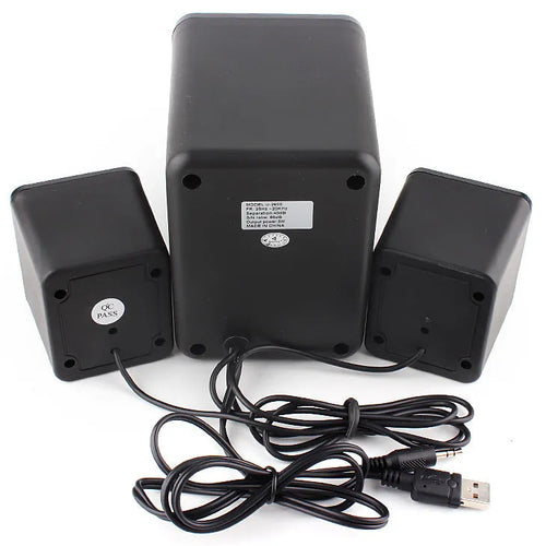 Green 2.1 USB computer speaker with LED lighting on desktop
