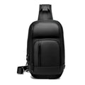 Black medium-sized PVC outdoor shoulder bag with a single strap and internal organiser pockets.