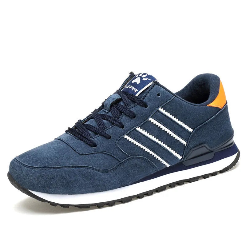 Blue leather sneakers for men with low-top design, pigskin upper, and rubber sole on a plain background