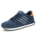 Blue leather sneakers for men with low-top design, pigskin upper, and rubber sole on a plain background