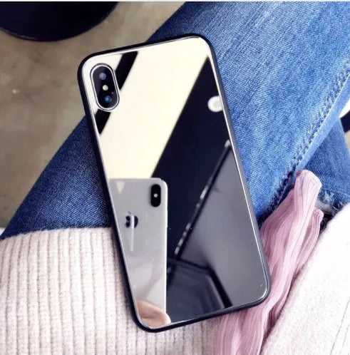 Black iPhone case with a built-in rectangular mirror on the back cover, compatible with iPhone X, 7 Plus, 8 Plus, and 12 models.