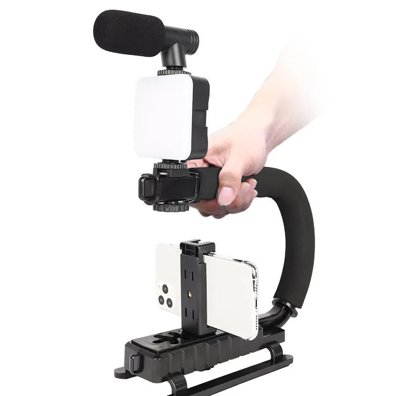 Universal LED mini square camera flash with rotatable head on a tripod stand.