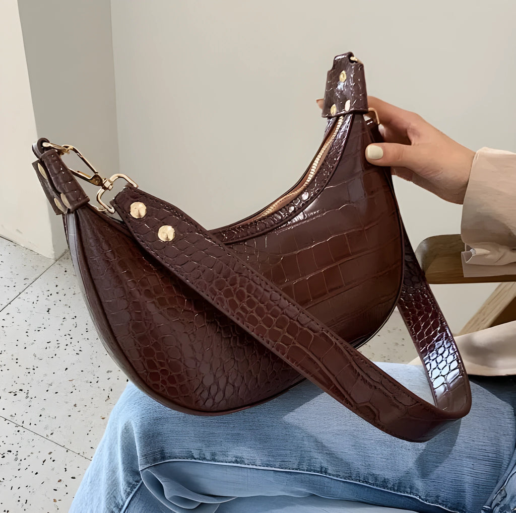Retro crossbody bag for women in PU leather with 24cm top width, black colour, compact design