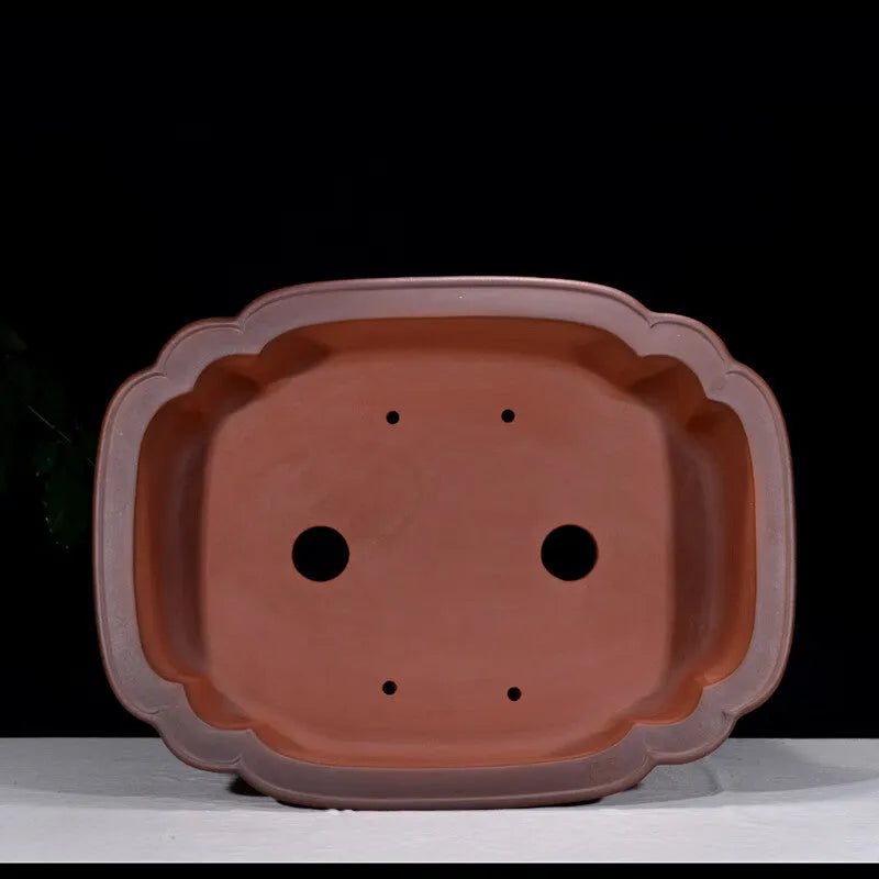 Large antique-style purple clay flowerpot with Chinese design for garden planting