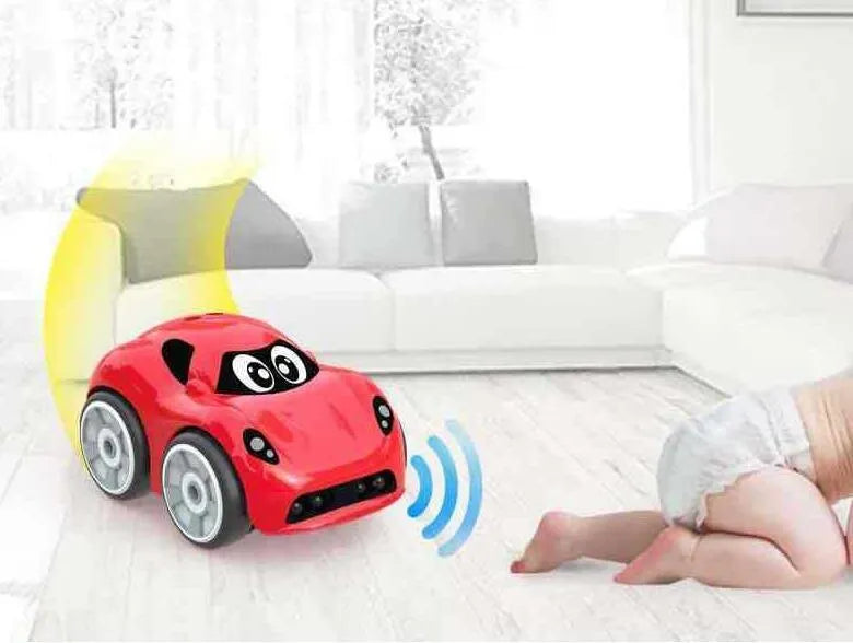 Electric children's toy car with somatosensory remote control, plastic construction, red colour, obstacle avoidance feature