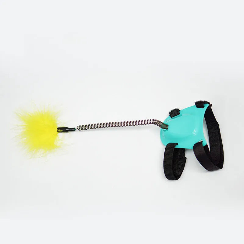 Green cat toy funny cat stick with strong feathers on a plain background