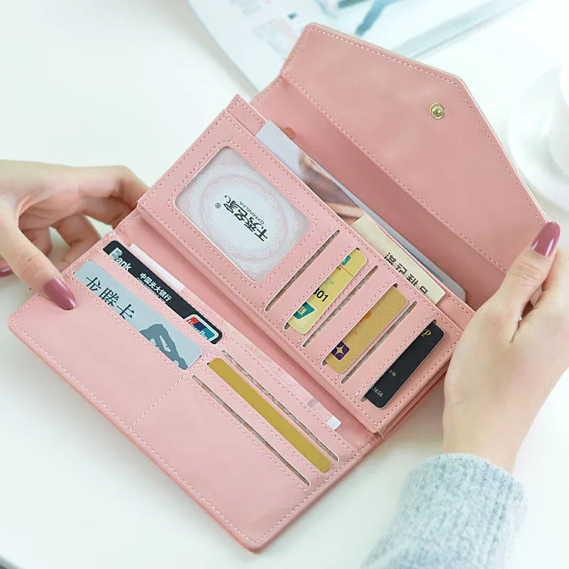 Student wallet with buckle closure and three-fold design in multiple colour options
