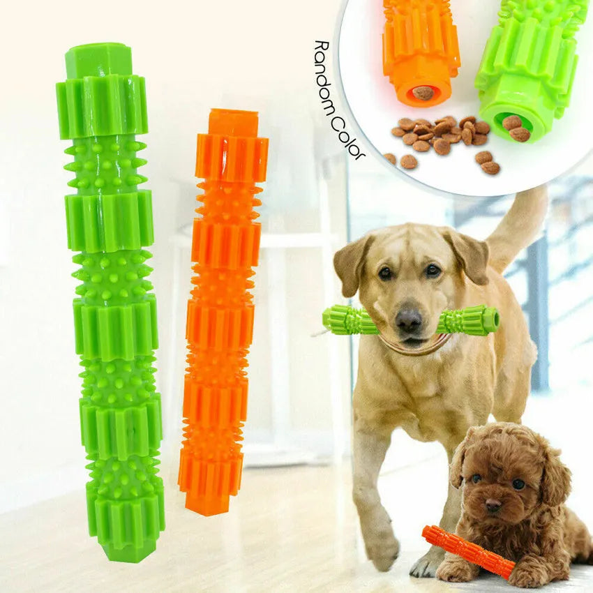 Green and orange durable rubber dog chew toy with squeaker and treat-dispensing hole.