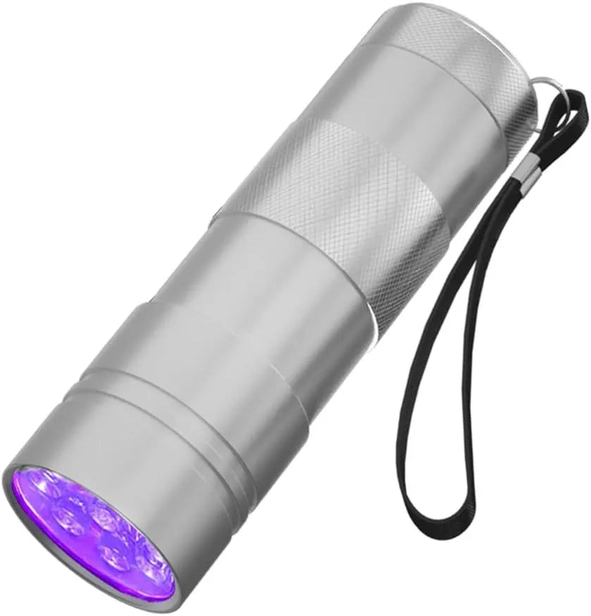 Black and silver aluminium UV flashlight with dimensions shown for scale.