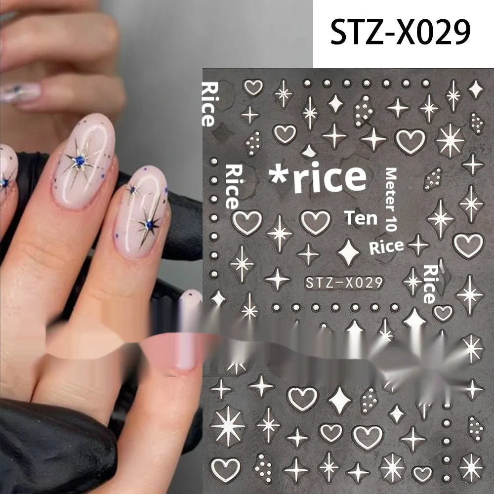Pack of black and silver striped nail art stickers with cartoon and love pattern designs.