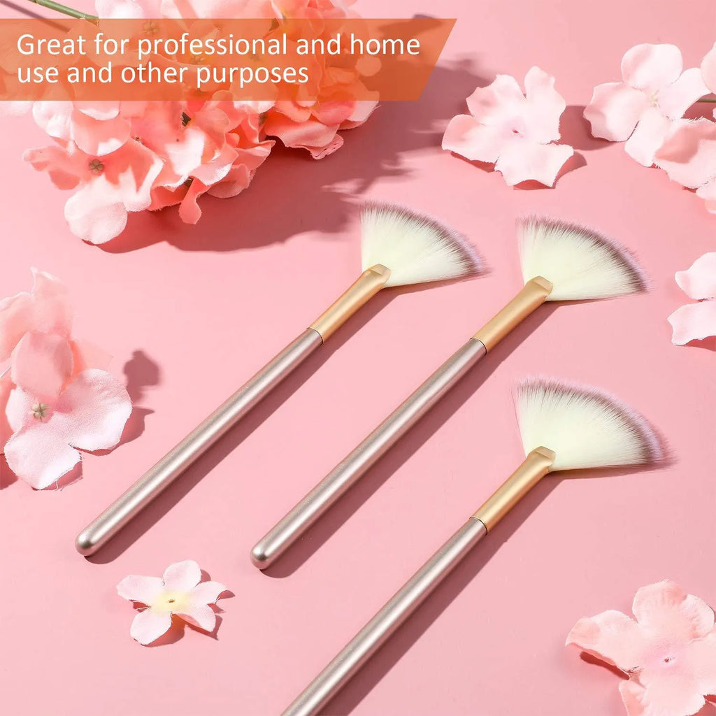 Ten champagne-coloured facial fan brushes with acrylic handles and protective covers.
