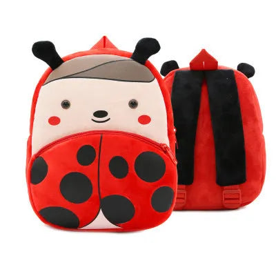 Cute plush animal backpack for children in elephant design, showing front zipper and straps.