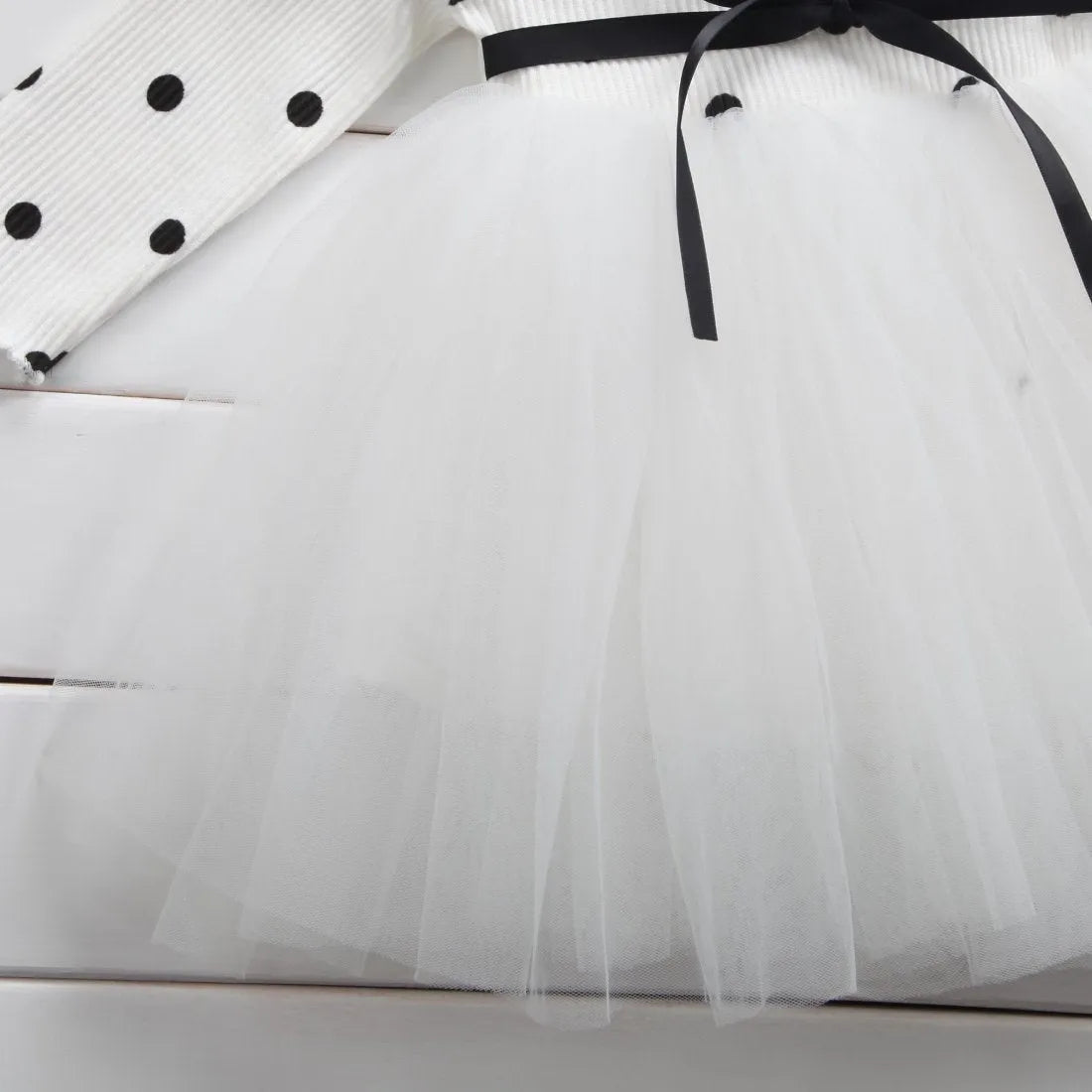 Baby girl's long sleeve black tutu lace dress for birthday parties and christenings.