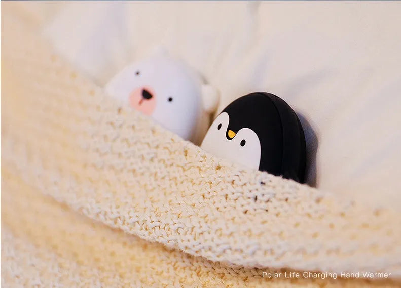 Cute cartoon penguin and polar bear design USB rechargeable electric hand warmer.