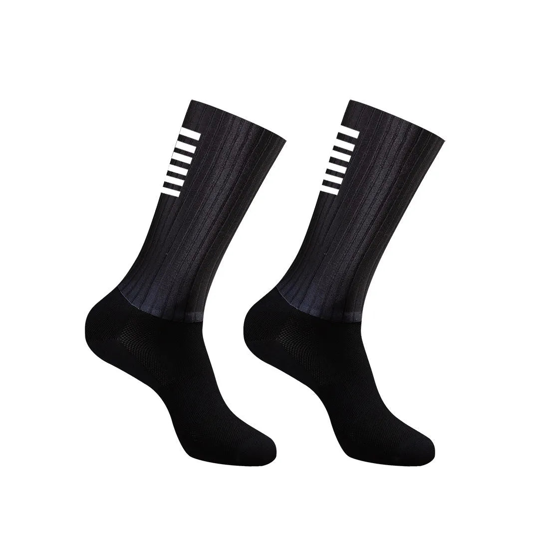 Cycling socks in chemical fibre blend fabric shown in orange, black, purple, white, grey and dark blue colour options