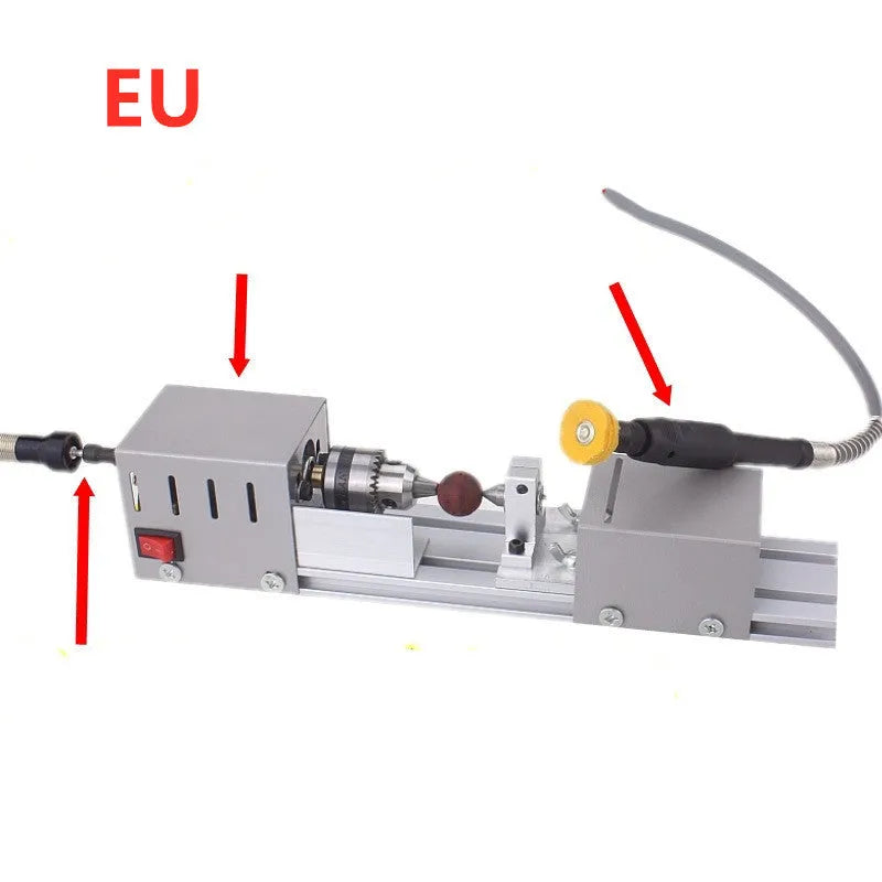 Compact metal mini woodworking lathe with carving knives on workbench