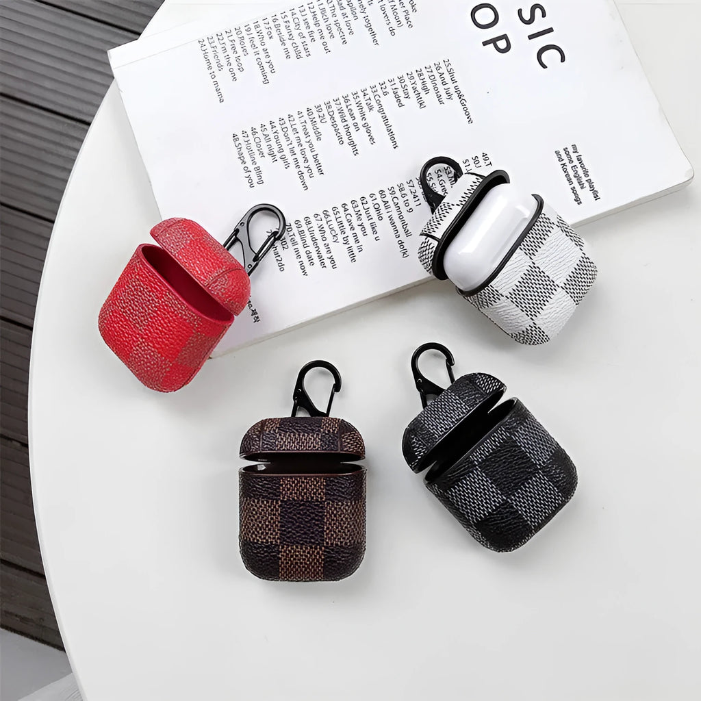 iPhone XS Max hard shell plastic case with grid pattern and integrated hook for Apple AirPods 2nd gen case.