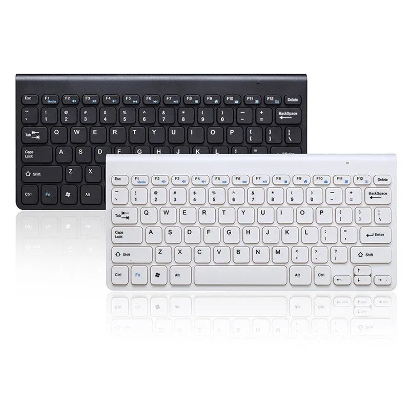 Black wireless keyboard and mouse set with USB receiver on wooden desk