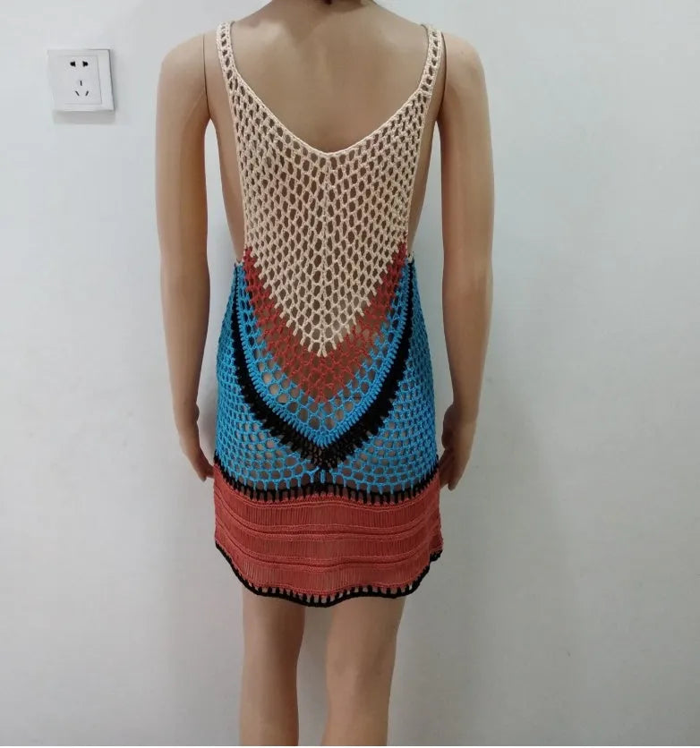 Beige knitted cutout bikini top with cropped length and lightweight polyester fabric on white background
