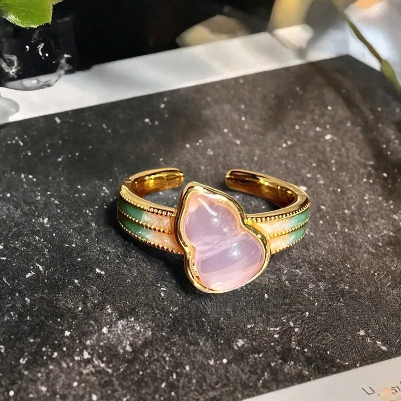Adjustable copper ring with vintage oil dripping gourd design, zircon inlay, and floral bow shapes in New Chinese style.