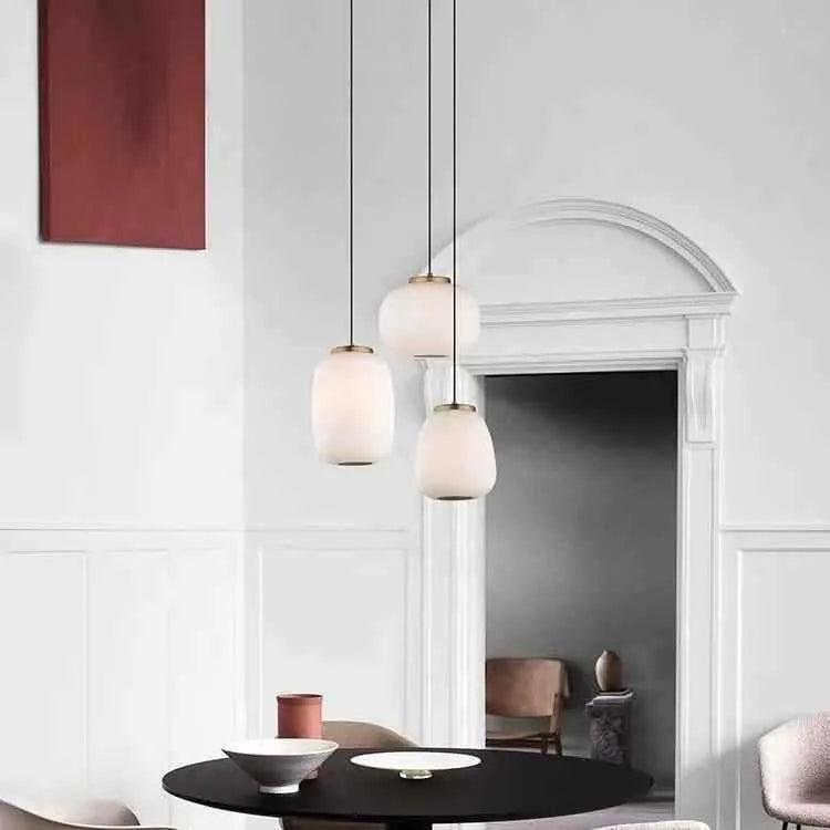 Modern minimalist long chandelier with iron frame and glass accents, warm LED light, Type C style