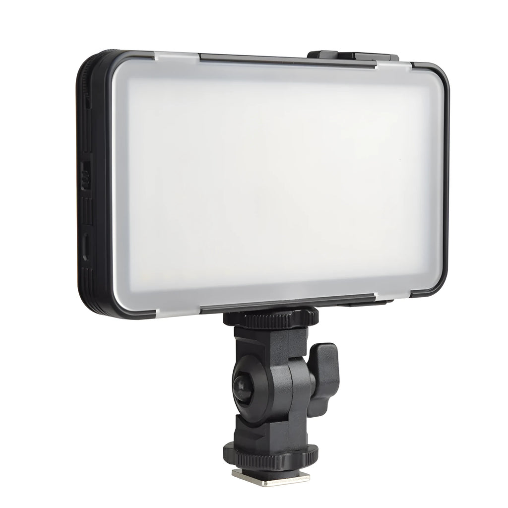 Slim silver Shenniu M150 LED video light mounted on a mobile phone showing its thin 20mm aluminium profile.