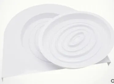 Blue cat toilet trainer with grooved removable trays placed on a white toilet seat