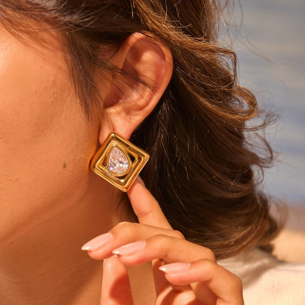 Geometric stainless steel stud earrings with water drop zircon stones in 18K gold colour